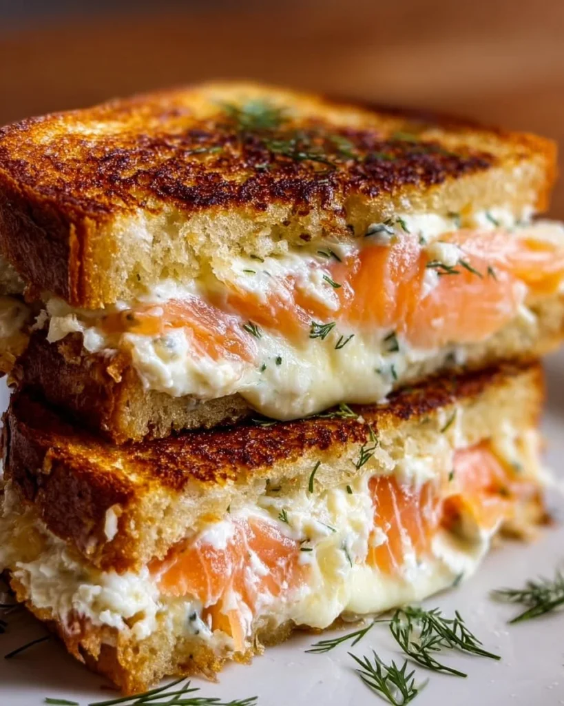 Delicious smoked salmon grilled cheese sandwich on a plate