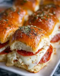 Delicious homemade pepperoni sliders served on a platter