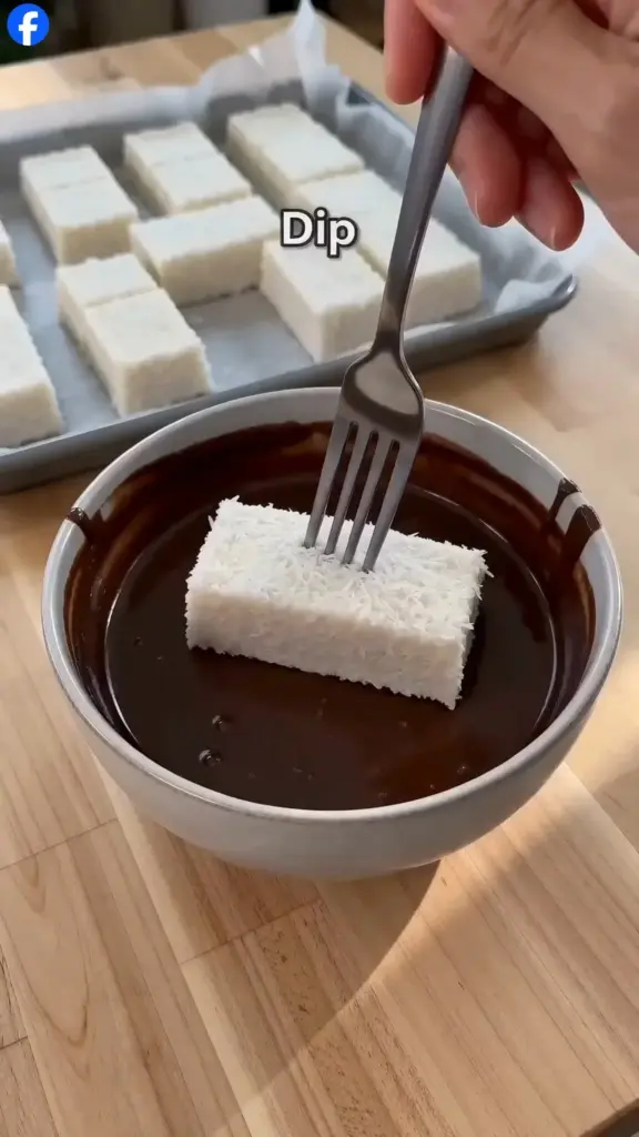 Delicious homemade 3-ingredient frozen Bounty Bars with chocolate and coconut.