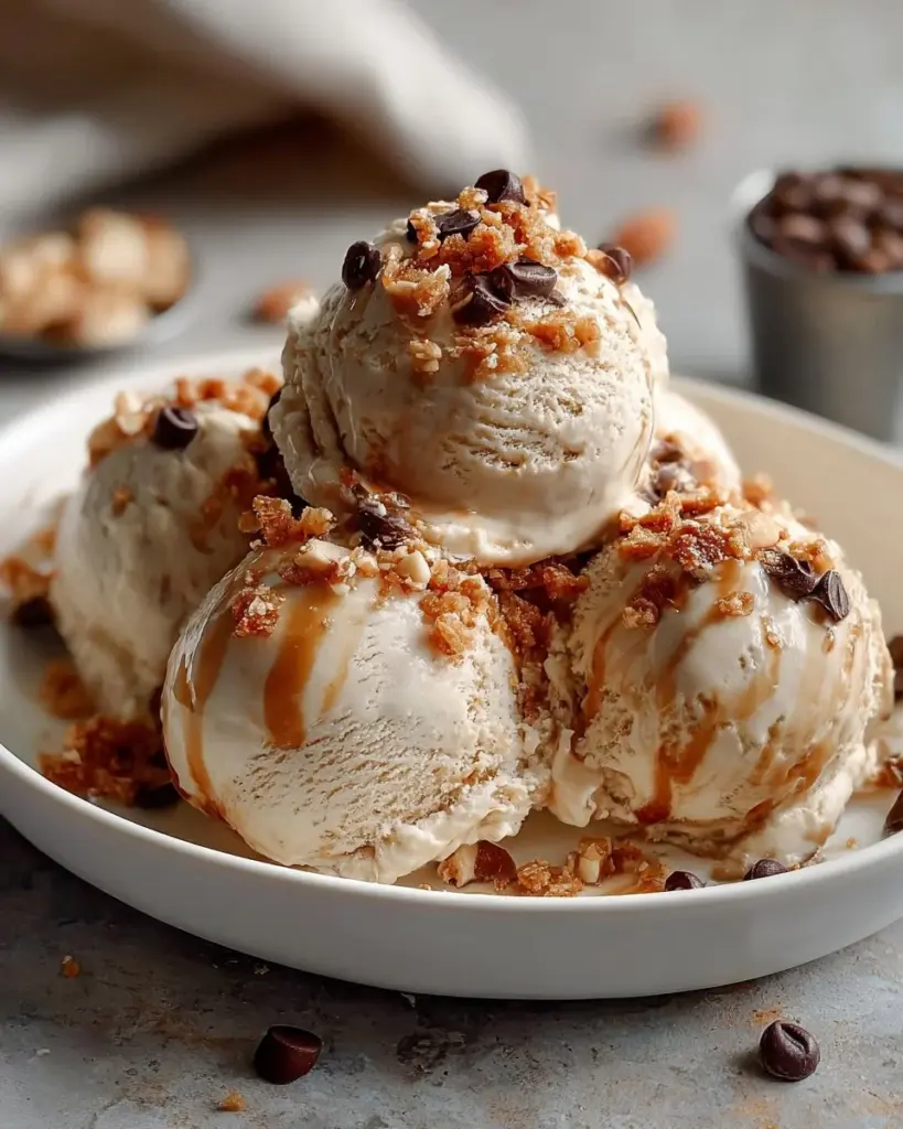 Creamy coffee crunch ice cream with crunchy chocolate bits in a bowl