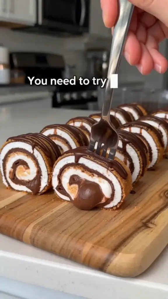 Delicious S'mores Sushi Rolls featuring chocolate, marshmallow, and graham cracker flavors
