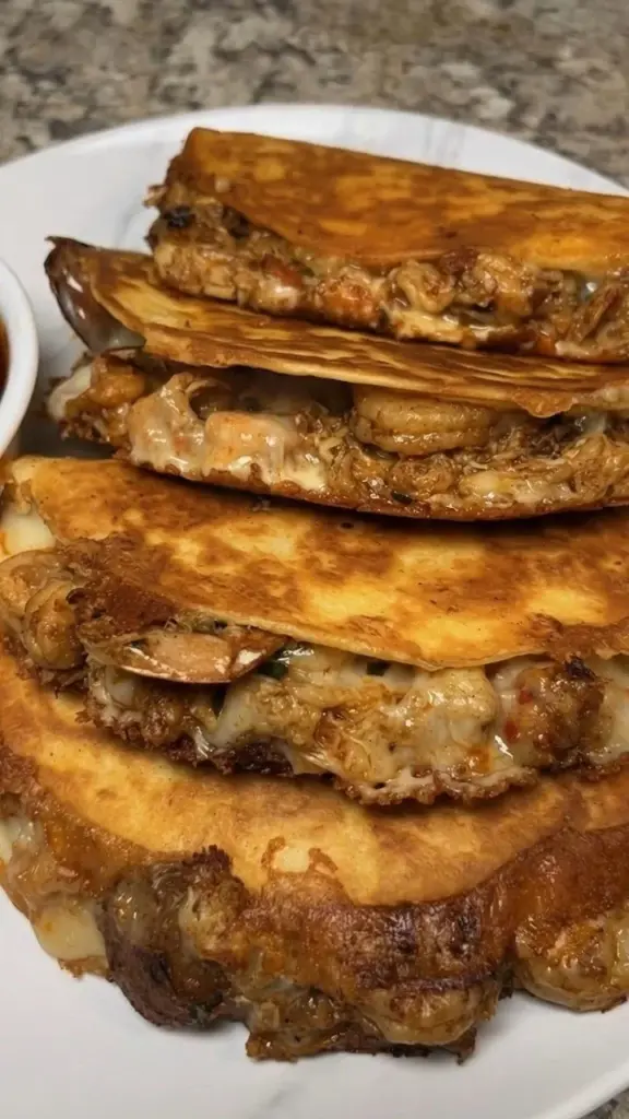Delicious seafood boil tacos loaded with shrimp, crab, and spices
