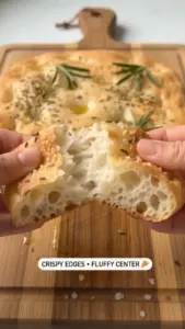 Delicious homemade focaccia sticks served with dipping sauce.